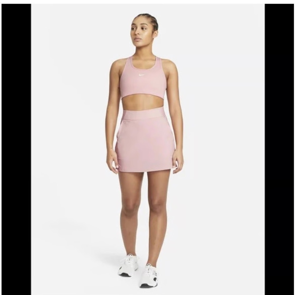 Nike Swoosh Dri-FIT Racerback Sports Bra in Pink Glaze